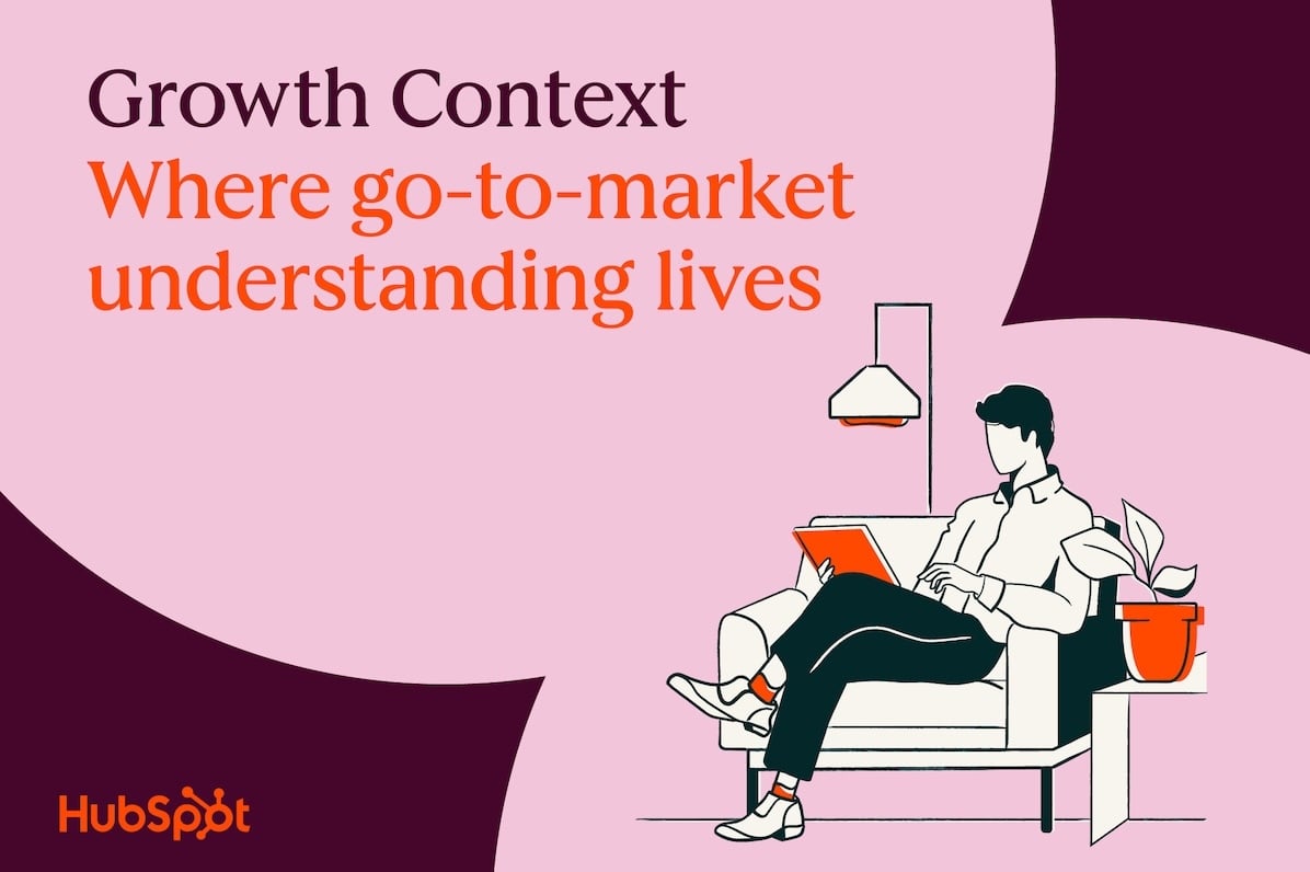 Person sitting on couch with laptop and coffee cup, illustrating go-to-market strategy concept